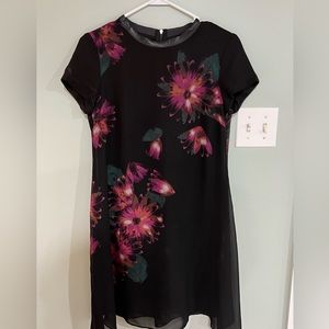 Taylor Black a-line mini.  Size 6